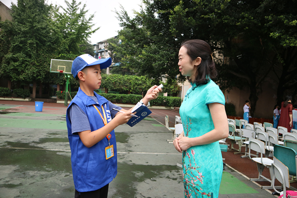 新华小记者走进西南交大子弟小学,开展国学文化寻根之
